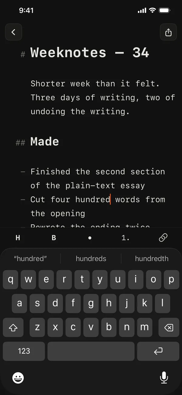 A document on iPhone showing dimmed Markdown markers in the margin