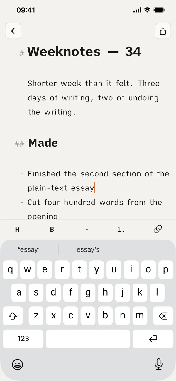 A document on iPhone showing dimmed Markdown markers in the margin