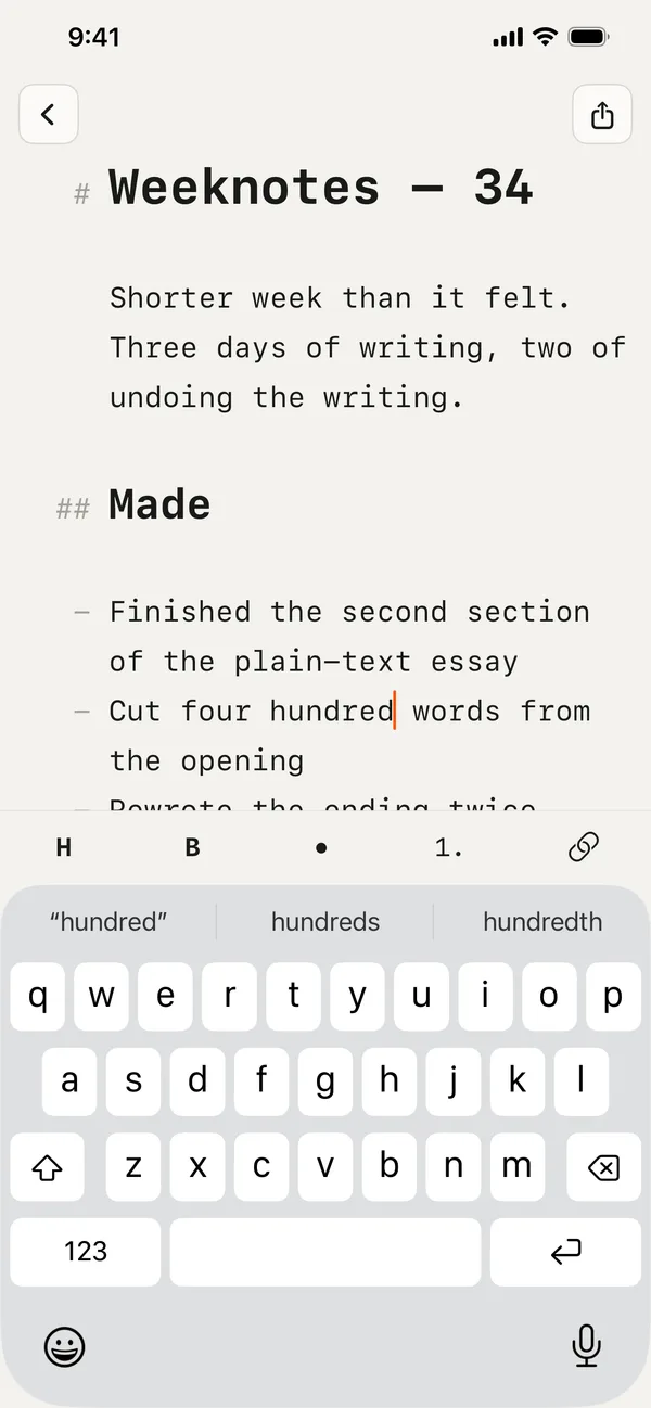 A document on iPhone showing dimmed Markdown markers in the margin
